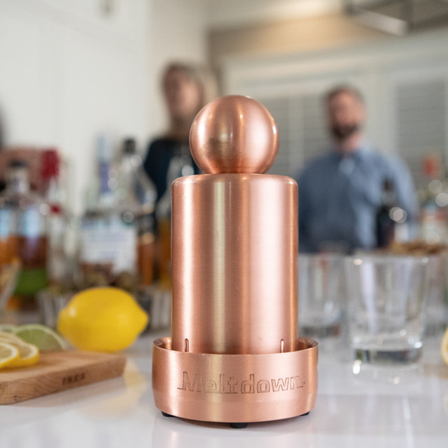 Meltdown is the ultimate ice cream ball press.  Made from 99.8% solid copper, Meltdown makes exquisite scoops of ice cream.  The scoop is the perfect shape for the ice cream in your drink.  Compared to ice cubes, a scoop of ice has 24% less surface area on the drink.  This means less beverage dilution for the same cooling power.