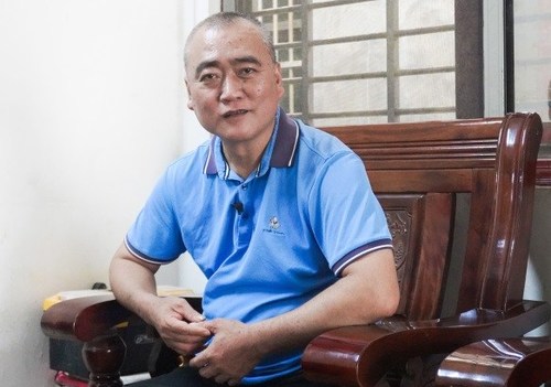 Wang Haibian at his house in Maniao, Lingao County, Hainan Province in south China, on November 18 (LI NAN)