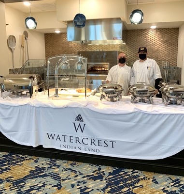 Chef Shawn MacDonald and Richard Keller prepare to serve seniors a Thanksgiving feast at Watercrest Fort Mill-Indian Land Assisted Living and Memory Care in South Carolina.
