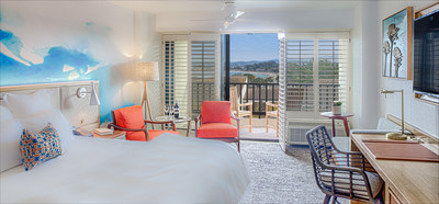 Newly renovated guestroom at the Portola Hotel & Spa at Monterey Bay. The newly renovated and coastal inspired accommodations offer a relaxing escape with modern, timeless interiors and upgraded amenities. Each of the 379 Monterey hotel accommodations features beautiful wall coverings, contemporary furniture, air conditioning, headboards with built-in lighting and USB outlets, ceiling fans, and double pane windows. Guest rooms offer one King or two Queen Beds.
