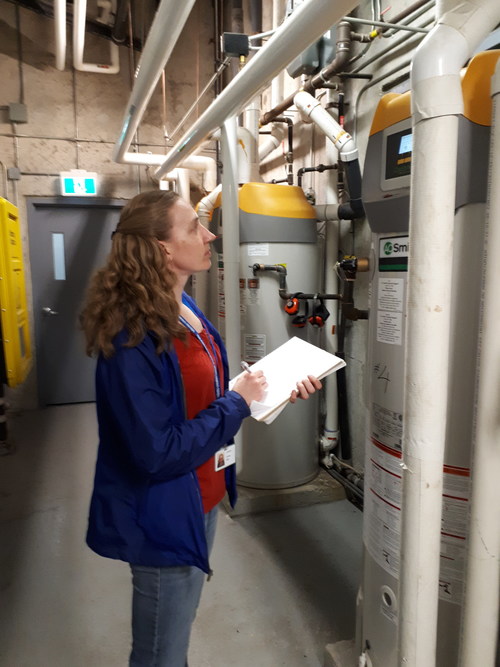 Joanna Jackson, Senior Building Performance Specialist, monitors utility consumption at a Minto Apartments rental property (CNW Group/The Minto Group)