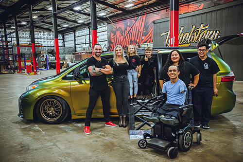 Xavier Sanchez and the Cruising Kitchens team cheesing in front his new whip
