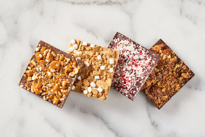 From left to right: Milk Chocolate & Peanut Brittle, Caramelized Chocolate Marshmallow Graham, Dark Chocolate Peppermint Bark and Dark Chocolate Almond Toffee are the four flavors from the newly available Chocolates line in Illinois from Cresco Labs' Mindy's Chef Led Artisanal Edibles brand. (CNW Group/Cresco Labs, Inc.)