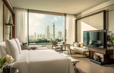 Guestrooms balance Thai touches and contemporary aesthetics with high ceilings and floor-to-ceiling windows