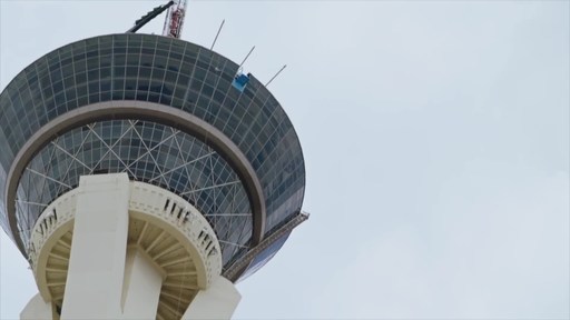 SkyJump Powered by MTN DEW at The STRAT is a heart-pounding, open-air controlled descent with speeds topping 40 mph from 855 feet above the Las Vegas Strip. The attraction holds a Guinness World Record as the highest commercial decelerator descent facility.