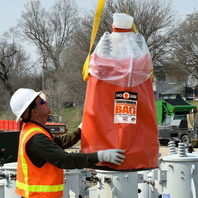 Safely move the transformer using the manufacturer's lifting lugs.