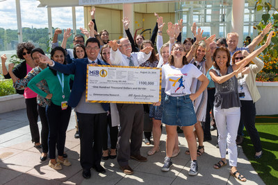 Dr. Alex Huang, recipient of Outsmarting Osteosarcoma 2019 grant, accepts MIB Agents big check alongside OsteoWarriors and their families.