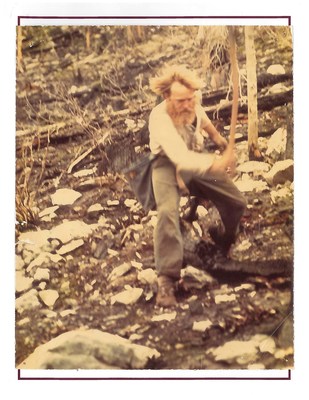 Dirk Brinkman swings his hoedad to plant a tree near Glacier National Park, B.C., 1973. Photo by Doug Cowell, courtesy Brinkman Reforestation Ltd. (CNW Group/Forests Ontario)