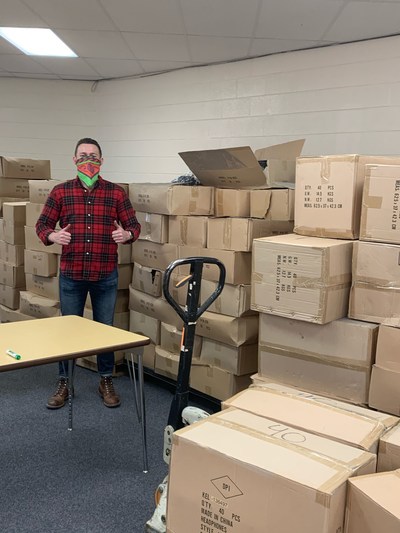 Kellyco's Purchasing Director, Nathan Barr, brings over $50,000 worth of audio equipment to Knox County for virtual-learning students.