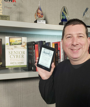 Author Scott N. Schober seen here with latest Kindle and hard cover editions of Senior Cyber