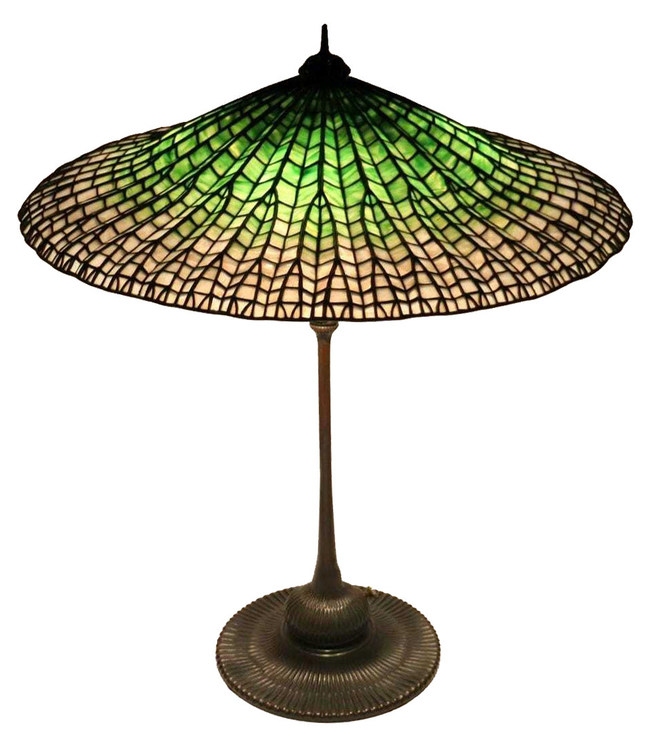 Tiffany Studios table lamp with 'Lotus' shade. Sold by Clarke Auction through LiveAuctioneers for $150,000