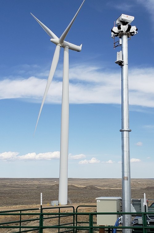 IdentiFlight system tower in a wind farm