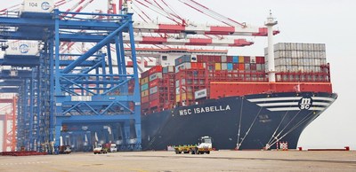 One of the world’s largest container vessels, MSC Isabella, berths at Xiamen Port on March 17, 2020. [Photo provided to China Daily]