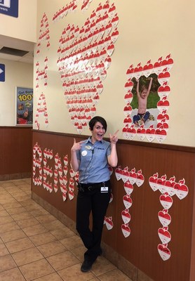 Team member, Hannah Lewis, is pictured from 2019's Life is Why campaign standing near the heart wall in honor of her son, Bennett, at the Pilot Travel Center in Cleveland, Tenn.