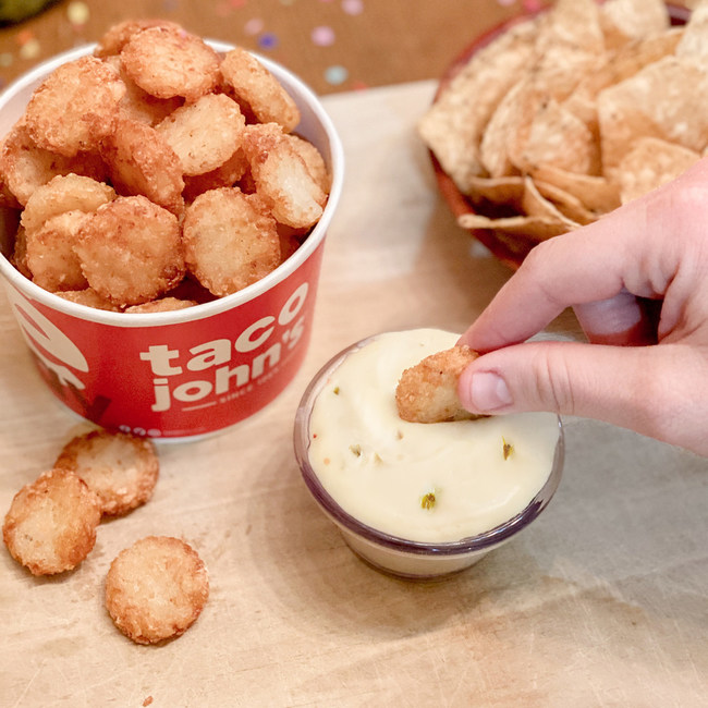 Taco John's offers FREE premium queso and launches social media challenge beginning Feb. 1