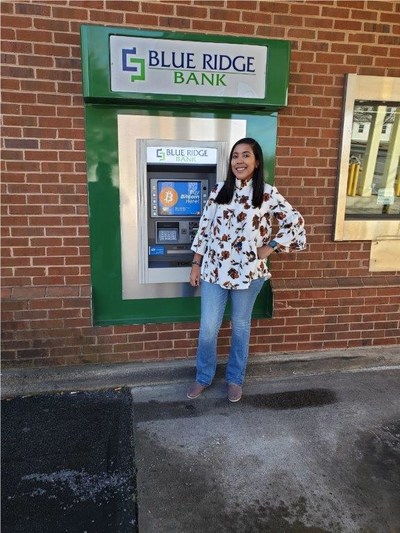 Blue Ridge Bank employee Daesha Graves at BRB’s Mineral (Virginia) Branch Drive-Through ATM with Bitcoin capability.