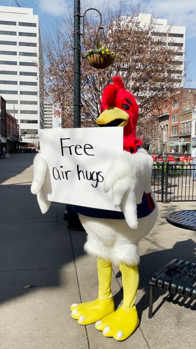 Zaxby's mascot Big Z is spreading the love, because who doesn't want free air hugs?