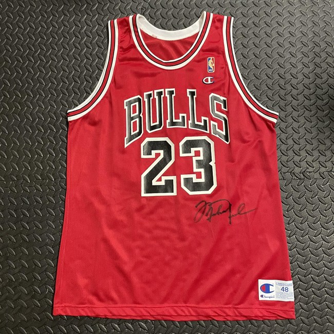Michael Jordan double-signed Chicago Bulls jersey, size 48, made by Champion. Very fine condition. Estimate $1,000-$2,000