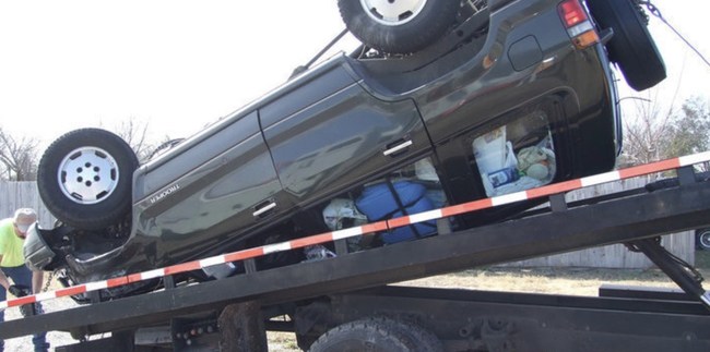 Improperly loaded Isuzu Trooper by a Georgia Roadside Assistance Tow Provider