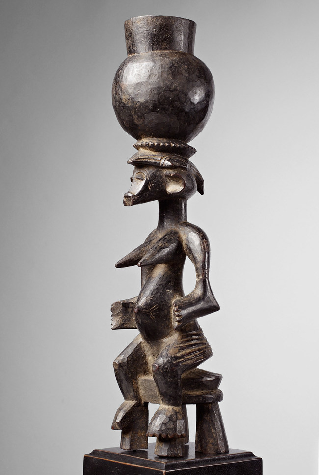 On offer from Pace African & Oceanic Art at the Virtual San Francisco Tribal and Textile Art Show, a Senufo seated figure from the Ivory Coast (height of 14 5/8 inches).