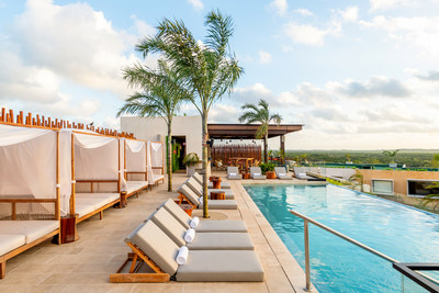 Infinity pool at Atico Rooftop Lounge & Bar, which overlooks the Mayan ruins, stunning beaches and the city
