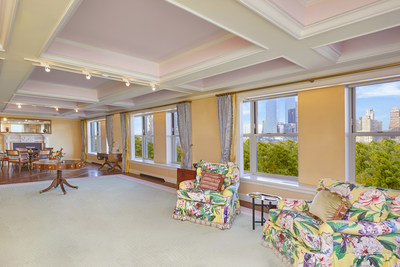 The condominium occupies one entire floor within an ultra-exclusive building in the Lenox Hill neighborhood of Manhattan’s Upper East Side. Its sprawling great room (shown here) is 46 feet wide and surrounded by large windows with direct views over Central Park. NewYorkLuxuryAuction.com.