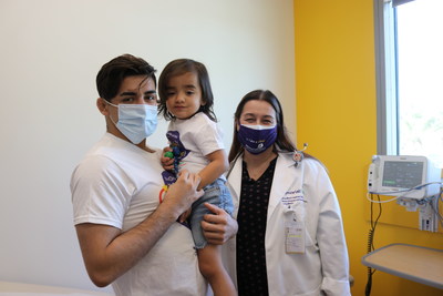 Brothers Joziah, 2, and Aaron, 19, see their specialty physician, Dr. Jacqueline Casillas, in the Children's Village.