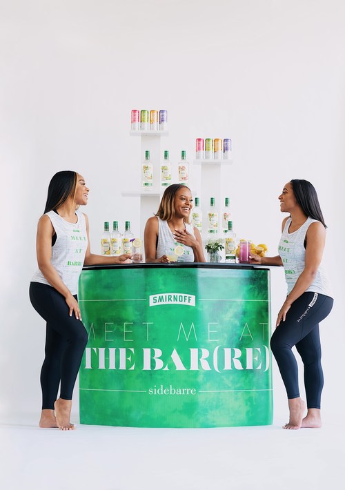 SideBarre Founder, Jillian Carter, and her two founding instructors Maya Dennis and Alexis Miller enjoy Smirnoff Zero Sugar Infusions cocktails (and a mocktail) at the Smirnoff bar.