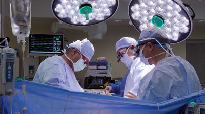 Dr. Kiran Dhanireddy, from left, Dr. Vijay Subramanian and Dr. Lucian Lozonschi complete the first combined heart-liver transplant at Tampa General Hospital on March 10, 2021.