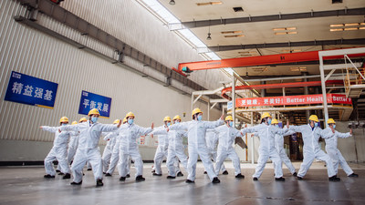 A Squad from XCMG Excavator Unit Plays Tai Chi as Part of Exercise between Shift Breaks.