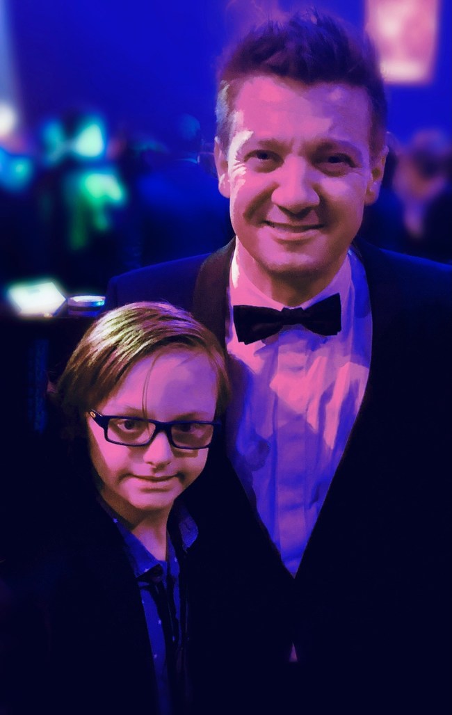 Guion The Lion narrated by actor and singer Jeremy Renner debuts on Audible on Sunday, 3/21 World Down Syndrome Day. Pictured above is Jeremy Renner with Guion, the inspiration behind the book. Photo Credit: Avengers: Endgame World Premiere & After Party