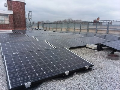 Workers have finished the installation of solar panels at NYCHA’s Carver Houses development. Photo credit: Accord Power Inc.