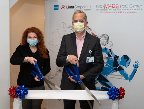 Louis A. Shapiro, CEO and President of HSS, and Nicole Karen Esposito, Vice President, Global Marketing and Market Access at LimaCorporate, attend the ribbon cutting for the grand opening of the ProMade PoC [Point of Care] Center today. (PRNewsfoto/Hospital for Special Surgery)
