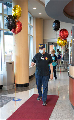 Navy Veteran and CarolinaEast Volunteer Jim O'Connor says returning to his volunteer role of delivering newspapers to patients and staff throughout the hospital is 