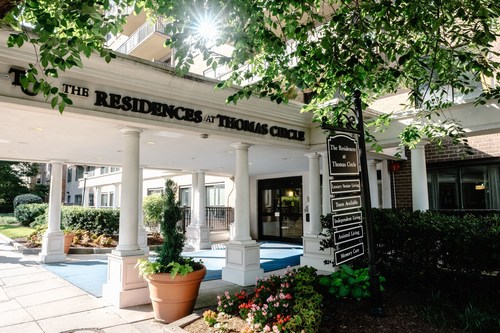 The inviting entrance at The Residences at Thomas Circle is representative of the warmth felt throughout the community.