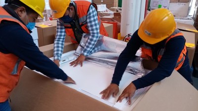 BIRMEX packing polio vaccine in cold-shipping boxes for transport by Direct Relief to Nicaragua.