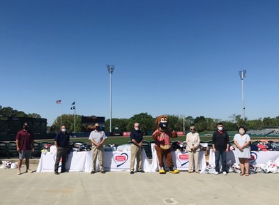 L-R: Representatives from College of Charleston baseball; representatives from Suburban Propane; Charlie, the Charleston RiverDogs mascot; representatives from Lowcountry Orphan Relief; and representatives from Tanger Outlets.