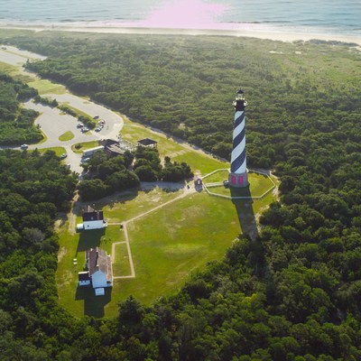 You can now enjoy the view atop Cape Hatteras Lighthouse from the comfort of home or your mobile phone, thanks to a new partnership between the National Park Service, Outer Banks Visitors Bureau, OBX Forever and Surfline. A new webcam atop America's tallest lighthouse is the first of three to be installed at national park sites on the Outer Banks.