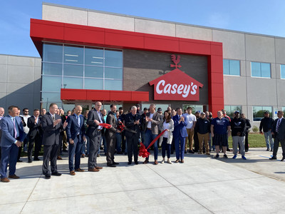 Gov. Mike Parson joins company executives and local leaders to cut the ribbon at the grand opening event