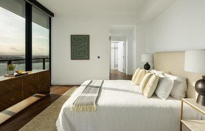 This photo shows a bedroom in a model unit at Heron, the first residential rental building to open in the highly anticipated Water Street Tampa neighborhood.