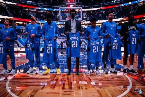 Each Orlando Magic player during the National Anthem prior to Sunday's game against the Houston Rockets held up a jersey that had a name of a fallen U.S. soldier listed on the back. Each family received/will receive the signed jersey.