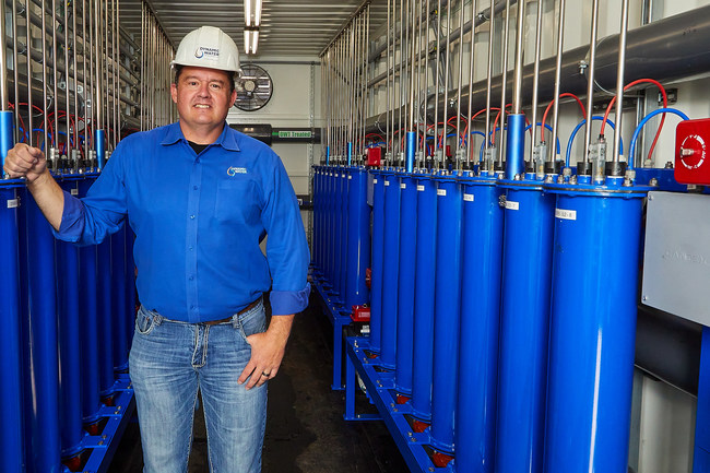 Mike Boyko, co-founder and COO of Tempe, Ariz.-based Dynamic Water Technologies, has spent his 30-year career working with companies that promote a healthier environment. The DWT water treatment system shown here uses electrolysis to clean the water, resulting in millions of gallons of saved water each year.
