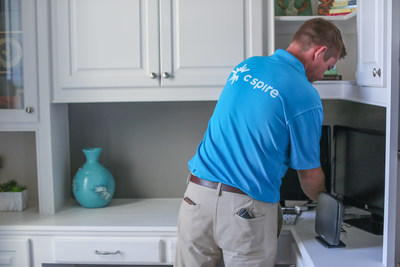 A C Spire Home technician installs fiber-based, ultra-fast Gigabit internet in a home. The company is accepting customer pre-orders for service in Helena and Pelham, Alabama now and in Alabaster, Alabama soon.