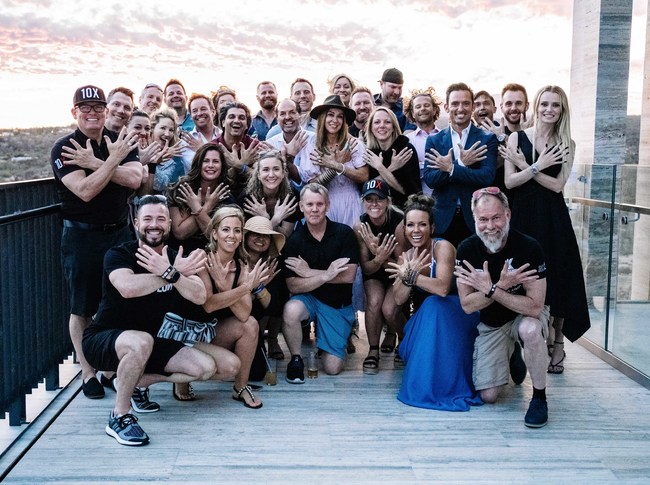 Brandon Dawson with mentors and attendees attending the Cabo Mastermind hosted by Cardone Ventures.