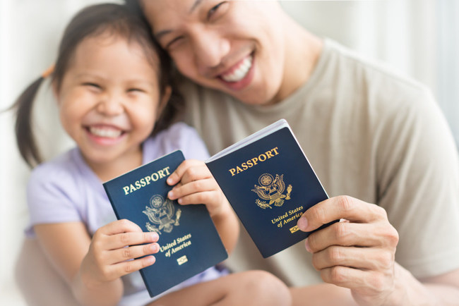 Asian immigrant family with passports