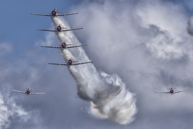 The GEICO Skytypers Air Show Team's aerial demonstration includes more than 20 different maneuvers and formations. This photo shows how the team prepares to demonstrate their bomb burst maneuver.