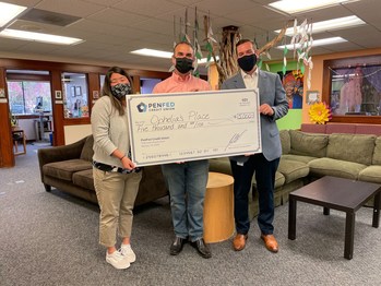 PenFed presents Ophelia’s Place with a $5,000 donation. From left to right: Ophelia’s Place Vice President of Programs Laura Sanchez, Vice President of Development Hadee Sabzalian and PenFed SVP Regional Service Center Chris Martin.