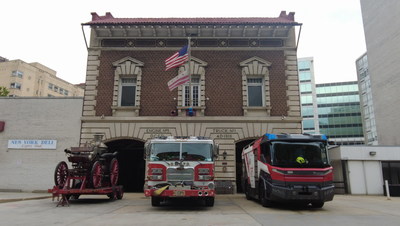 Rosenbauer showcases the Revolutionary Technology (RT), America's first electric fire truck (pictured right) in Washington, D.C. Shown alongside an antique steam engine (pictured left) and a current fire apparatus (pictured center), the Rosenbauer RT is one of the most notable innovations in the fire industry.