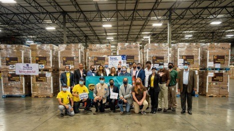 Pic: Members of the Sewa International Team with UPS representatives at the UPS warehouse in Atlanta
