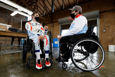 Robert Wickens (left) and Michael Johnson talk about the track day.